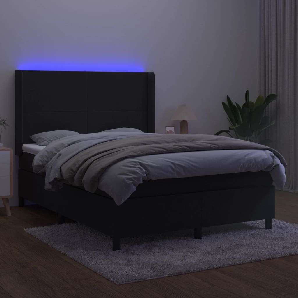 Box spring postelja z vzmetnico LED črna 140x190 cm žamet